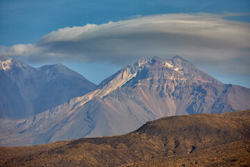 Silent and immense—Chachani Volcano up close. Through the telephoto lens, this towering Andean...
