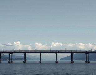Obraz premium A long bridge stretches across calm water with mountains and a cloudy sky in the background, creating a serene and balanced landscape.