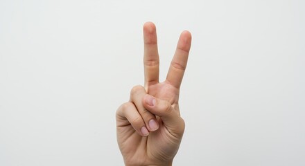 Hand showing peace sign gesture