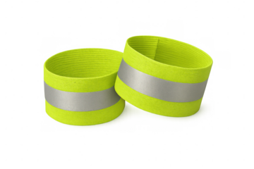 Fluorescent yellow reflective armbands providing high-visibility safety for nighttime runners, cyclists, and pedestrians against clean background