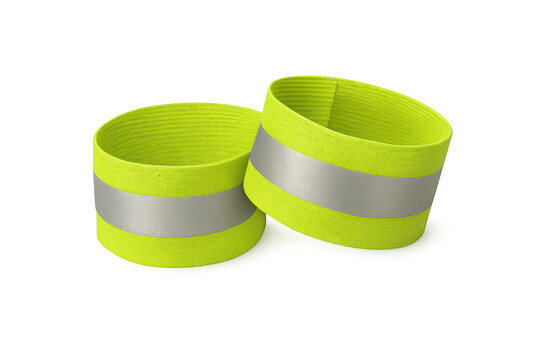 Fluorescent yellow reflective armbands providing high-visibility safety for nighttime runners, cyclists, and pedestrians against clean background