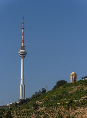 Baku TV Tower Rises Above Green Hill