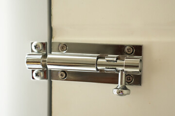 Close-Up of a Metal Door Bolt Latch
