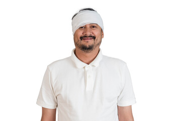Portrait of smiling injured man with head bandage in white shirt on white background showing recovery concept