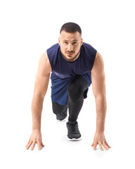 Obraz premium Sporty young man preparing to run marathon on white background