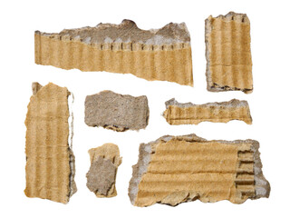 Pieces of torn or cut brown cardboard isolated design element on transparent background.