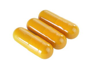 Bulk orange capsule pills isolated on white background.