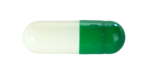 One green capsule pills isolated on white background.