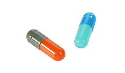 Bulk multi-colored capsule pills isolated on white background.