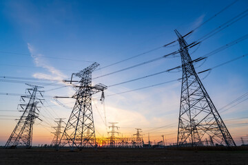 The pylons are in the evening, Substation in the evening, High voltage substation and beautiful sunset glow