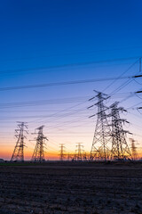 The pylons are in the evening, Substation in the evening, High voltage substation and beautiful sunset glow