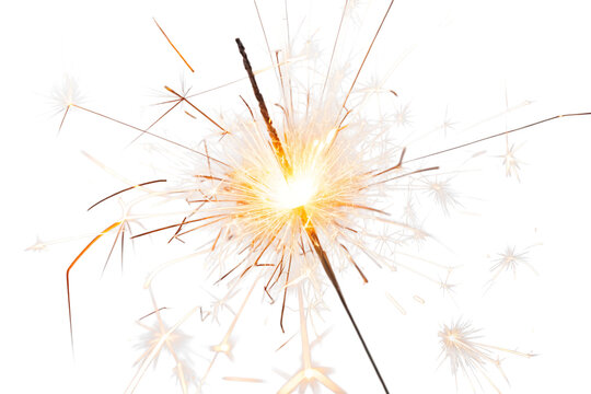 Celebrating With Sparklers Glowing In The Dark Of Night