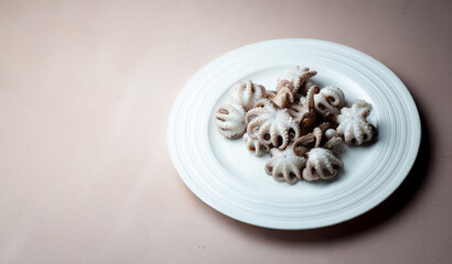 Boiled webfoot octopus on a plate