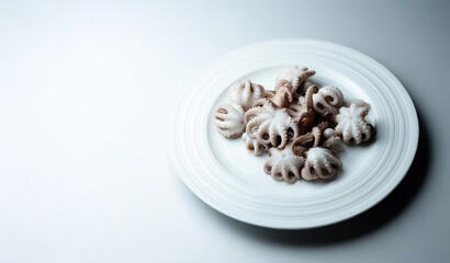 Boiled webfoot octopus on a plate