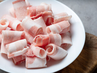 Frozen pork belly on a plate