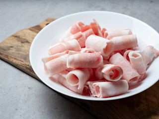 Frozen pork belly on a plate