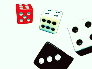 close-up of red white and black dice rolling isolated on a white background. games of chance abstract illustration