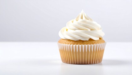 Single vanilla cupcake with fluffy white frosting on a clean white background.