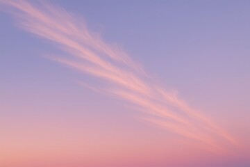 Obraz premium Soft Pastel Sky with Streaks of Pink Clouds at Sunrise or Sunset