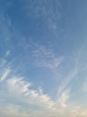 It's a sunset sky with fluffy clouds.
