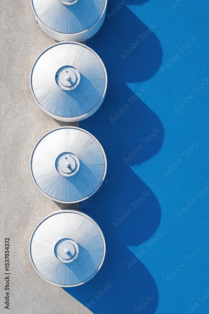 Aufkleber aerial view of circular biogas digesters with pipes on concrete foundation in modern sustainable was