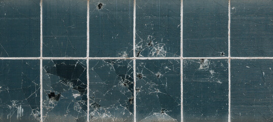 Close-Up of Cracked Wired Glass Window with Heavy Damage