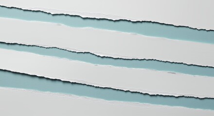Torn paper strips on light blue background