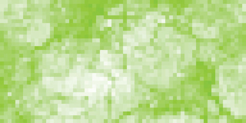 Abstract green pixelated background with a mosaic style of varying shades and tones creates a vibrant textured effect ideal for artistic and modern design projects