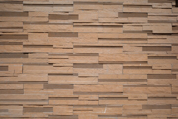 A false brick-like cladding on the side of a building