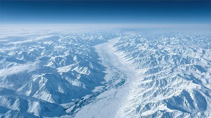 Fototapeta premium Snowy mountain range viewed from above.