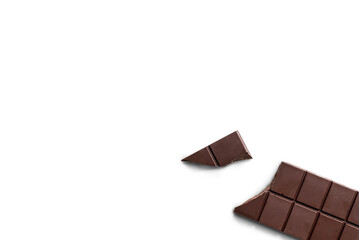 Broken organic dark chocolate bar isolated on a transparent background with shadow from above, top...