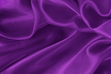 Dark purple fabric texture background, detail of silk or linen pattern.