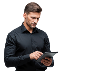 Professional businessman in black shirt using a tablet, focused on screen, isolated on transparent background