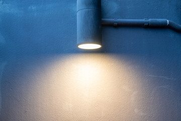 Night lights on concrete wall background