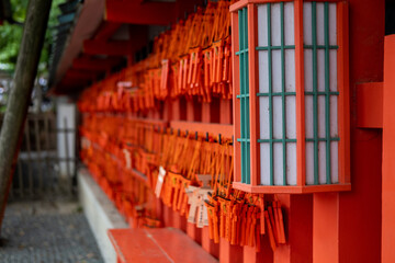 Japanese lanterns with a background of prayer in a Japanese temple