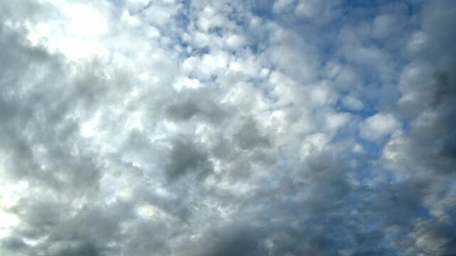 Dramatic Cloudy Sky with Sunlight Peeking Through the Atmosphere