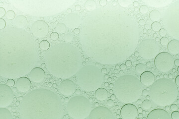 Macro microscope green bubble texture, Close-up Green bubbles and drops oil background . blue green...