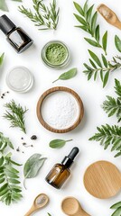Top View of Glass Bottles, Wood Bowls and Spoons with Herbs on White Background
