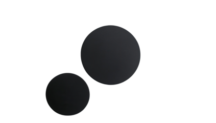 Two dark circles, slightly offset, with colorful, faint edges