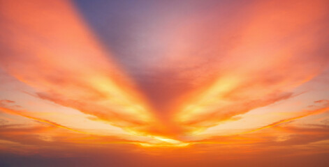 Vibrant fiery sunset over the ocean with silhouettes of cargo ships on the horizon, painting the...