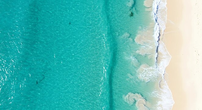Aerial beach ocean turquoise water sand white waves summer vacation view