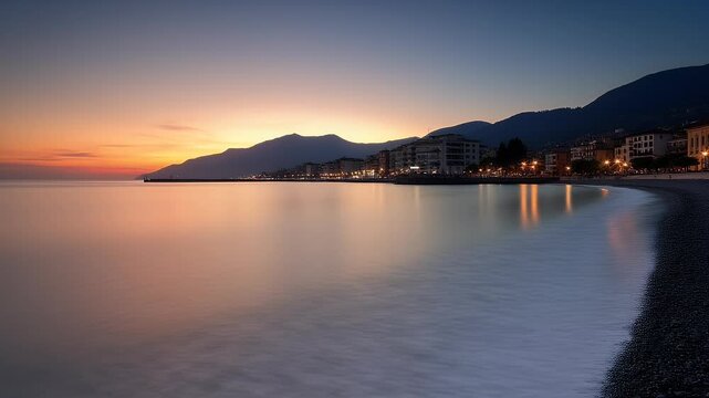 Tranquil View of a Coastal Harbor and Beach at Sunset in a Quiet Bay