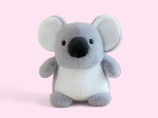 Innocent cute funny little koala animal toy on the pink background