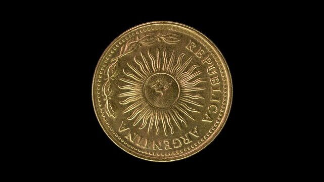 Argentina 1978 10 pesos coin obverse showing Sun of May rotating on black background