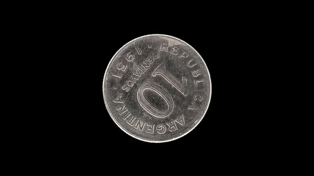 Argentina 1951 10 centavos coin obverse with large denomination rotating on black background