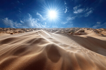 Naklejka premium Golden sand dunes shimmer under a bright sun in a clear blue sky