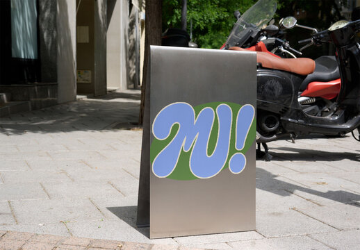 Mockup A-frame in Urban Setting of Madrid. PSD mockup template ready for your logo design