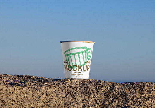 Sustainable Takeaway Cup on Rocky Surface