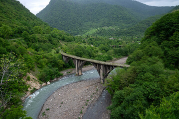 An abandoned bridge in the vicinity of the town of Akarmara. Republic of Abkhazia