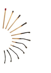 Matches on white background, collage with stages from whole to completely burnt